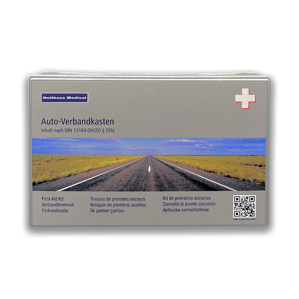 Auto-Verbandskasten Holthaus DIN 13164, schlagfester Kunststoffkasten mit Außenschutzfolie und 9-sprachiger Deckelbedruckung. Ideal für KFZ-Notfälle.
